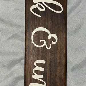 Brown Wooden Sign with White Script